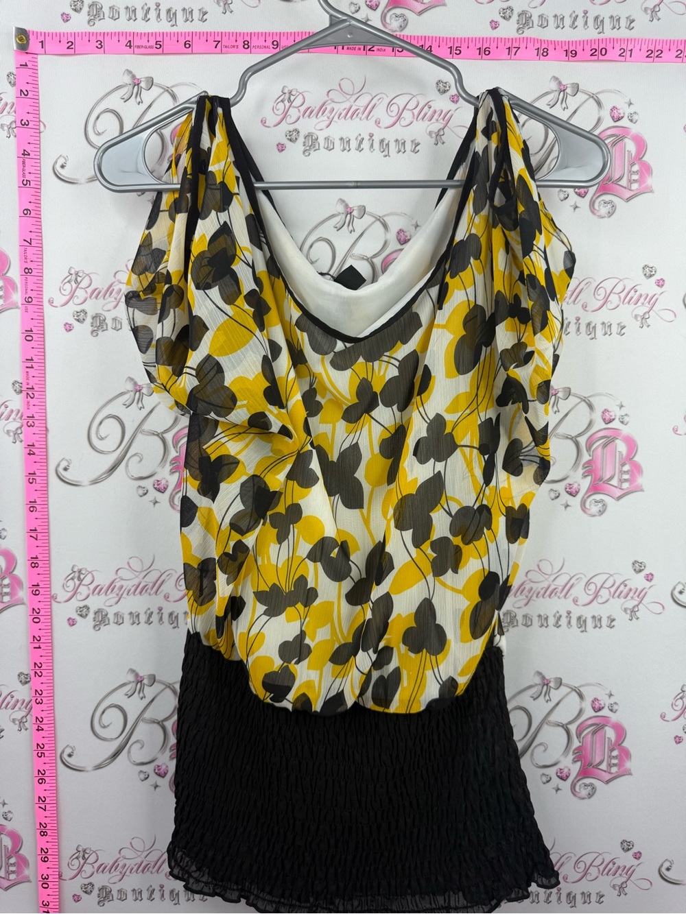 MAJORA blouse Sleeveless Yellow & Black Floral Blouse with Black Smocked Hem